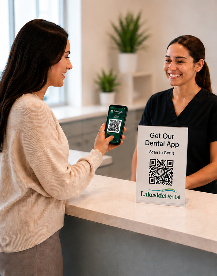 Patient scanning a dental mobile app QR code at check-in.